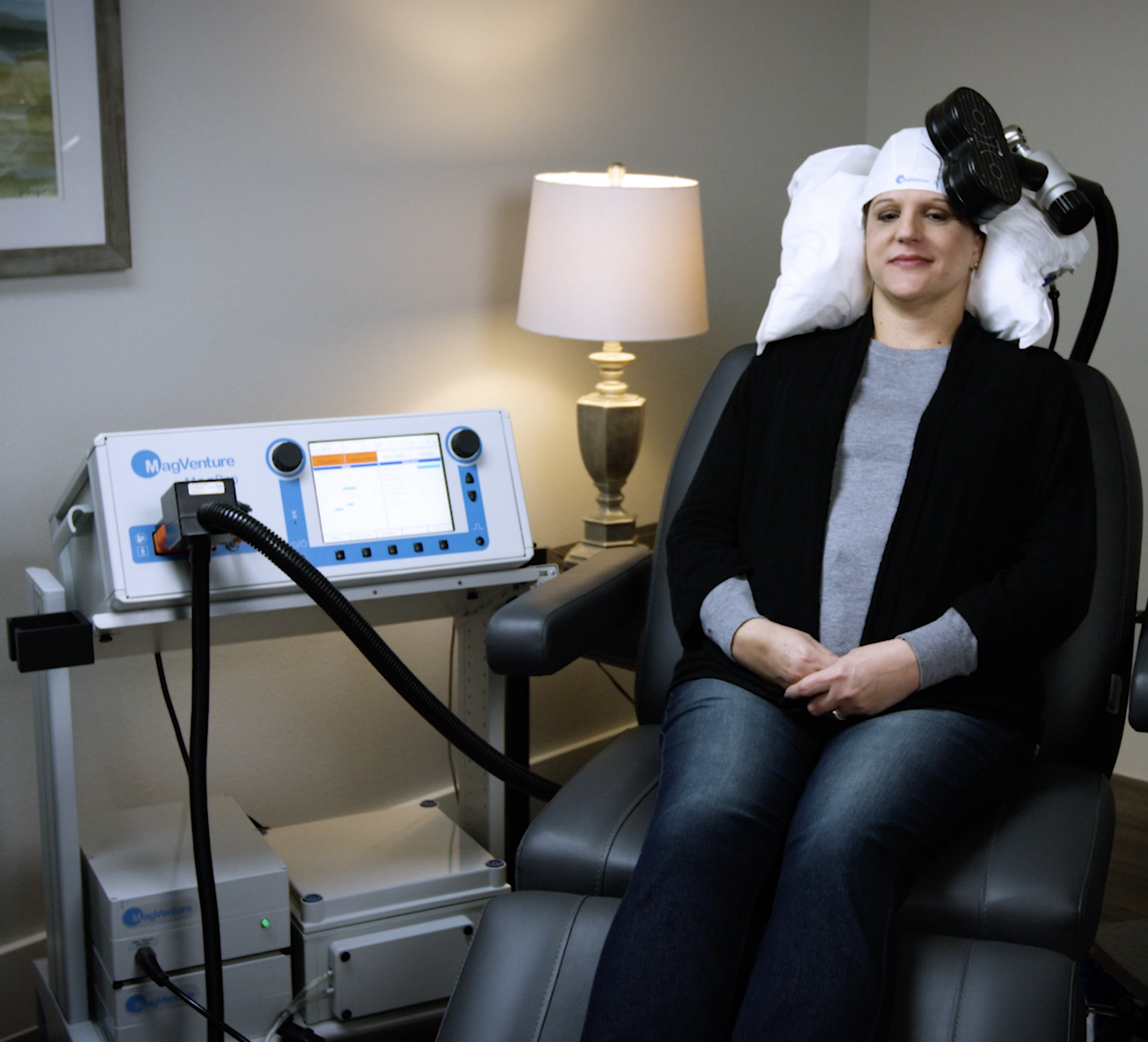 Patient sitting in TMS Chair Treating